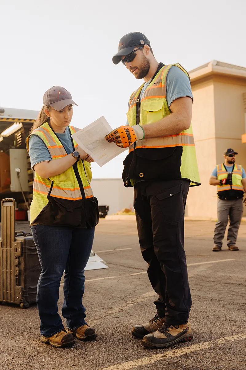 Working off of a prepared site map, the Aestus team works on prepping the site for scanning